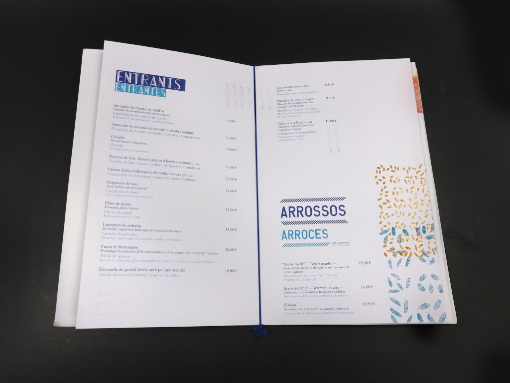 Disseny gràfic de cartes de restaurant amb materials premium